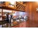 Close up of wet bar featuring granite countertops, lots of storage, and stainless steel appliances at 1735 Peachtree Ne St # 321, Atlanta, GA 30309