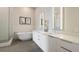 Spa-like bathroom with soaking tub and modern vanity at 40 12Th Ne St # 1903, Atlanta, GA 30309