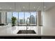 Modern kitchen with expansive city views from island at 40 12Th Ne St # 1903, Atlanta, GA 30309