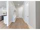 This entryway has hardwood floors, a storage nook, and leads to the kitchen at 216 Ewing Way, Dacula, GA 30019
