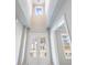 Bright foyer featuring high ceilings and transom windows for natural light at 216 Ewing Way, Dacula, GA 30019