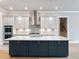 Elegant kitchen with a large island, stainless appliances, and ample lighting at 216 Ewing Way, Dacula, GA 30019
