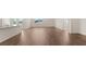 A modern living room with hardwood floors at 8593 Preakness Pass, Lithonia, GA 30058