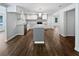 Modern kitchen featuring a center island with gray cabinets and stone countertop at 2122 Belhaven Se Ln, Atlanta, GA 30315