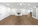 Living room featuring fireplace, hardwood floors and large window at 2122 Belhaven Se Ln, Atlanta, GA 30315