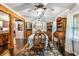 Cozy dining room with vintage furniture and natural light at 5795 Stewart Mill Rd, Douglasville, GA 30135