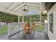 Covered patio with outdoor seating, perfect for entertaining and enjoying backyard views at 5365 Crow Rd, Cumming, GA 30041