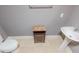 Small bathroom with pedestal sink and toilet at 799 Hammond Dr # 406, Atlanta, GA 30328