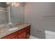Bathroom featuring granite countertops and a modern vanity at 799 Hammond Dr # 406, Atlanta, GA 30328