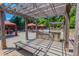 Outdoor kitchen with grill, pergola, and seating at 799 Hammond Dr # 406, Atlanta, GA 30328