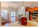 Open floor plan with a combined kitchen and living area featuring a fireplace at 799 Hammond Dr # 406, Atlanta, GA 30328