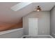 Loft area with skylight and ceiling fan at 799 Hammond Dr # 406, Atlanta, GA 30328