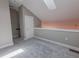 Loft bedroom with skylight and ceiling fan at 799 Hammond Dr # 406, Atlanta, GA 30328