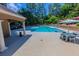 Resort-style pool with plenty of lounge chairs and tables at 799 Hammond Dr # 406, Atlanta, GA 30328