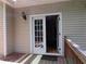 French doors lead to the back deck from inside the home at 1269 Heritage Dr, Villa Rica, GA 30180