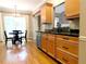 Kitchen with granite counters, stainless steel appliances, and an adjacent dining area at 1269 Heritage Dr, Villa Rica, GA 30180