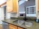 Kitchen features granite counters, stainless steel appliances, and maple cabinets at 1269 Heritage Dr, Villa Rica, GA 30180