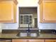 Kitchen features granite counters, stainless steel sink, and maple cabinets at 1269 Heritage Dr, Villa Rica, GA 30180