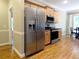 Kitchen featuring stainless steel appliances, granite countertops, and wood floors at 1269 Heritage Dr, Villa Rica, GA 30180