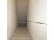 Carpeted staircase leading downward with a white handrail at 1269 Heritage Dr, Villa Rica, GA 30180
