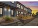 Beautiful townhomes featuring brick accents, covered porches, and professional landscaping at 945 Willingham Dr # 3, Hapeville, GA 30354