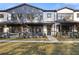 Charming townhomes with stylish trim, covered entryways, and professionally landscaped lawns at 945 Willingham Dr # 3, Hapeville, GA 30354