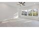 Bright and spacious bedroom with plush carpeting and large windows offering natural light at 947 Willingham Dr # 2, Hapeville, GA 30354