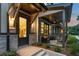 Charming covered porch and stone accents add to the curb appeal of this lovely townhome at 947 Willingham Dr # 2, Hapeville, GA 30354