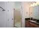 Bathroom features glass shower and vanity with granite counter at 705 Springer Mountain Dr, Canton, GA 30114