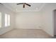 Spacious empty bedroom with carpet, tray ceilings, recessed lighting and plantation shutters at 705 Springer Mountain Dr, Canton, GA 30114