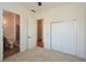 Bright bedroom with neutral carpet and access to ensuite bathroom and large closets at 705 Springer Mountain Dr, Canton, GA 30114