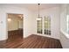 Dining area with views of an adjacent sitting area with French doors that let in natural light and overlook the yard at 705 Springer Mountain Dr, Canton, GA 30114