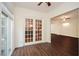 Entryway with hardwood floors leading to a doorway with glass french doors at 705 Springer Mountain Dr, Canton, GA 30114