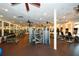 Resident gym with multiple machines, ceiling fans, and wall mirrors at 705 Springer Mountain Dr, Canton, GA 30114