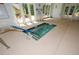 Indoor hot tub with accessibility rail and seating area, located near a large window at 705 Springer Mountain Dr, Canton, GA 30114