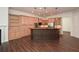 Kitchen with a large center island, stainless steel appliances, and ample storage, creating a functional space at 705 Springer Mountain Dr, Canton, GA 30114