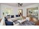 Inviting living room features hardwood floors, ample seating, and seamless flow to adjacent rooms at 705 Springer Mountain Dr, Canton, GA 30114