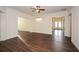 Spacious living area with wood floors, white walls, and ample natural light for versatile decor at 705 Springer Mountain Dr, Canton, GA 30114