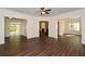 Expansive living room with wood floors and open access to multiple spaces at 705 Springer Mountain Dr, Canton, GA 30114