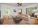 Bright living room features hardwood floors, neutral colors, and seamless flow to adjacent rooms at 705 Springer Mountain Dr, Canton, GA 30114