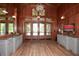 Grand community lobby with hardwood floors and refined console tables at 705 Springer Mountain Dr, Canton, GA 30114
