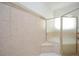 Updated glass-enclosed shower featuring tiled walls and a corner seat at 705 Springer Mountain Dr, Canton, GA 30114