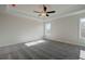 Spacious bedroom with ceiling fan and carpet at 4493 Eastbrook Pl, Snellville, GA 30039