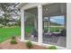 Relaxing screened porch with outdoor furniture at 4493 Eastbrook Pl, Snellville, GA 30039