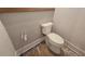 Powder room with penny round tile and modern toilet at 165 Cedarwood Ln, Roswell, GA 30075