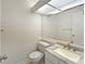 Bright bathroom features a marble countertop, large mirror, and tiled floors at 1084 Village Main St, Stone Mountain, GA 30088