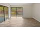 Living room featuring a sliding glass door leading to a deck, enhancing the indoor-outdoor living experience at 1084 Village Main St, Stone Mountain, GA 30088