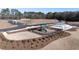 Aerial view of the community playground, gazebo, and surrounding area with walking paths and landscaping at 338 Elgin Dr, Lawrenceville, GA 30045