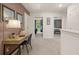 Hallway with a desk, leading to bedrooms with large windows and natural light at 338 Elgin Dr, Lawrenceville, GA 30045