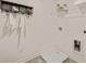 Functional laundry room with ample storage, shelving, and modern utility connections at 338 Elgin Dr, Lawrenceville, GA 30045